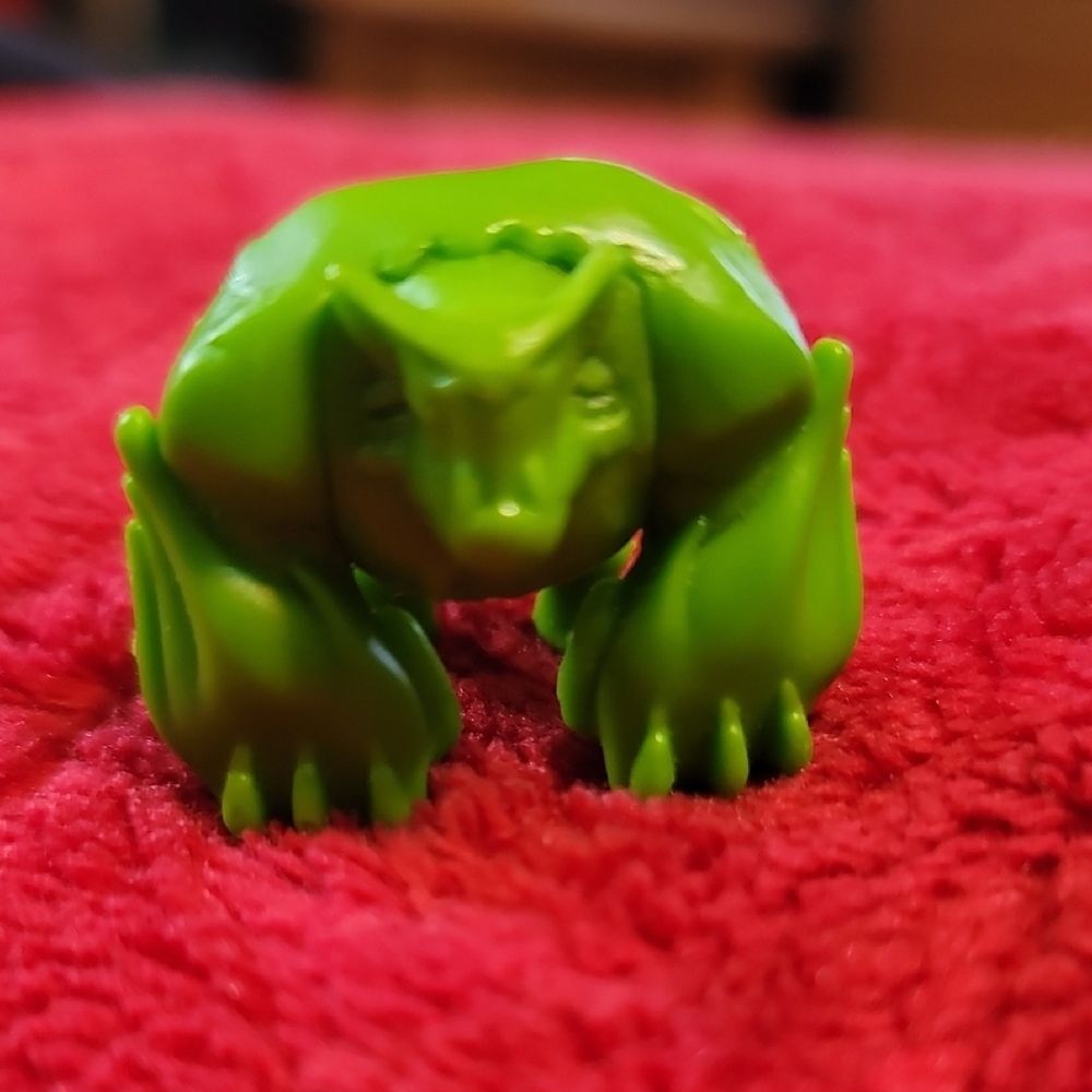 "Monster in My Pocket" (MIMP) toy, likely the Hulk In Smash Pose.